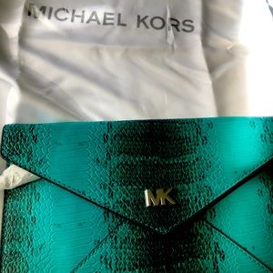 Michael Kors beautiful leather envelope style handbag. Brand new. Teal colored.
